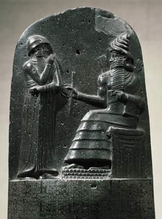 Detail of Stele of Hammurabi, full 7'4". Depicts King Hammurabi receiving divine inspiration from Shamash.